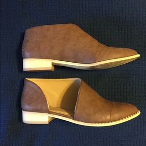 Slip on booties flats. Cut out side.
